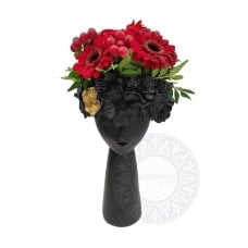 Black ceramic head with red flowers