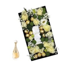 Arrangement with flowers and Jâ€™adore Solar and Floral Notes 30ml