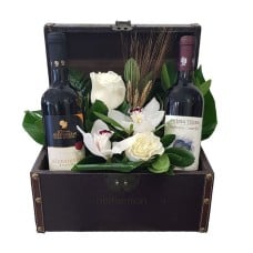 Wines and flowers in chest