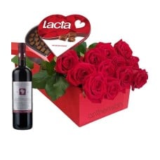 Red roses, chocolates and wine in gift box