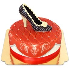 Chocolate shoe on red deluxe cake