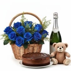 Basket of blue roses with sparkling wine,chocolate cake and teddy (Refined)