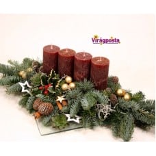 Advent table with pine and rustic candles