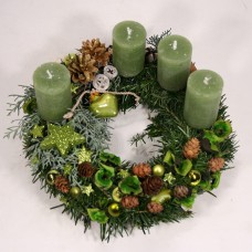 Advent wreath with green cylindrical candles