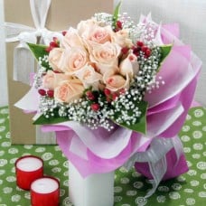 12 Champagne Roses With Cordyline Foliage Handbouquet