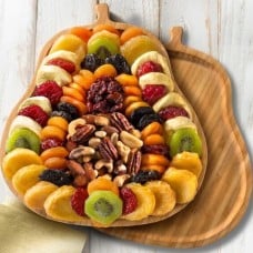 Festive Dried Fruit and Butter Toffee Pecans on Bamboo Pear Shaped Cutting Board