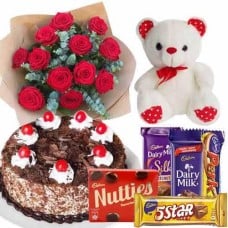 12 Red Roses, Chocolates, 1/2 Kg Cake And Teddy Bear