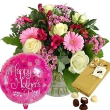 Mixed Flowers In A Vase, Chocolate Box And A Balloon