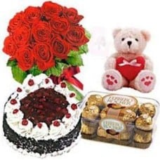 12 Red Roses Bouquet, 16 Ferrero Chocolates, 1 Kg Black Forest Cake And Free Teddy Bear