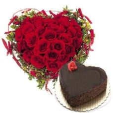 Heart Shaped Arrangement Of 25 Red Roses And 1.5 Kg Heart Shaped Chocolate Cake
