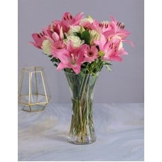 Pastel Seasonal Flowers In A Glass Vase