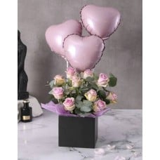 Lilac Roses And Balloon In A Black Box