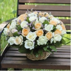 Basket,of,51,roses,White,and,peach,roses,with,green,flowers