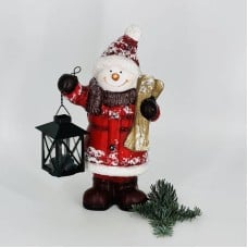 New,Year's,souvenir,candlestick,snowman,with,lantern
