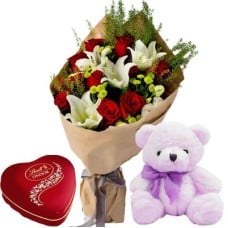 12 Red Roses & 1 Stem Lilies Bouquet, Teddy Bear & Lindt Heart