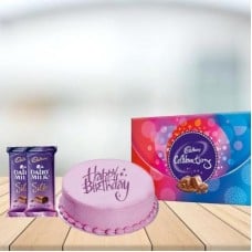 Strawberry Pink Cake with Assorted Chocolates Combo (1/2 kg Strawberry Pink Cake With Cadbury Celebration and 3 Cadbury Dairy Milk Silk (60 gm))