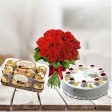 Cake, Flowers and  Chocolates (1 Kg Pineapple Cake, 12 Red Roses, 16 pc Ferrero Rocher)