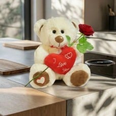 Sitting teddy bear approx. 28cm red heart (White sitting plush toy approx 28cm with red heart in misty feet)