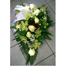 Funeral arrangement: white roses and orchids