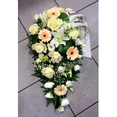 Funeral arrangement in white and creamy shades: rose, lilys, gerberas