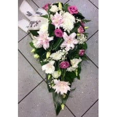 Funeral arrangement: lilys and pink spices