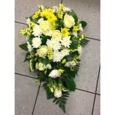 Funeral arangement: white roses, white and yellow chrysantemums