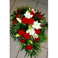 Funeral arrangement: red roses and white lilys