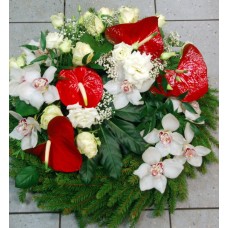 Funeral wreath: red anthuriums, white roses and orchids