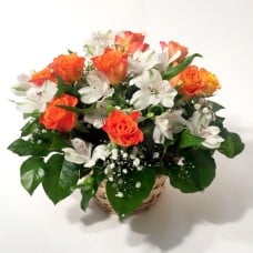Flower arrangement with orange roses, inkaliya and gypsum (11 Roses)