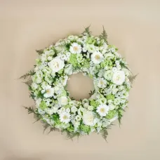Funeral wreath with roses and gerberas