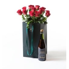 Red roses in a gift bag with bubbles