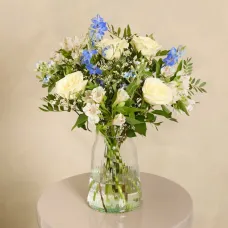 A sweet bouquet of blue and white flowers