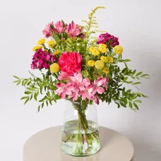 A mood-boosting bouquet of yellow and pink flowers