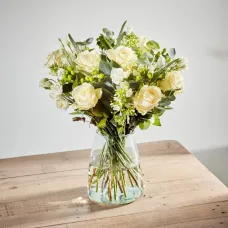 A serene bouquet of white roses