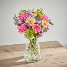 A pretty arrangement of pastel flowers