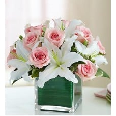 Low Arrangement Of Pink Roses And White Lilium
