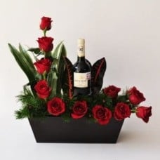 ARRANGEMENT 12 CRESCENT ROSES AND WINE