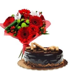 mixed red flowers and chocolate cake (bouquet of flowers and cake)