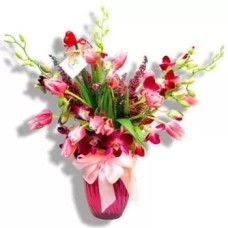 Inclined tulips with mixed flowers in pink