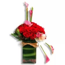 Red roses with mixed pink flowers