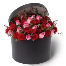 Red n Pink Blooms Popping out to the Black Box