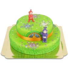 Teletubbies on a 2-tier flower meadow house cake