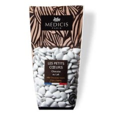 Small white heart-shaped dragees in milk chocolate (250g bag)