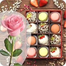 Strawberries in white and milk chocolate with coconut and nut topping and macaroons + pink rose