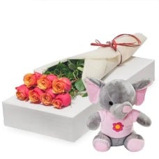 7 tea roses with pink elephant