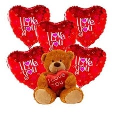 Arrangement of ballons with a teddy bear