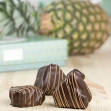 Fresh pineapple in dessert chocolate