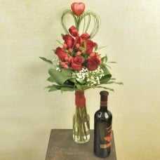 Bouquet of red roses with red wine