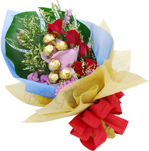 Red Roses W/ Ferrero Rocher Chocolate in a bouquet
