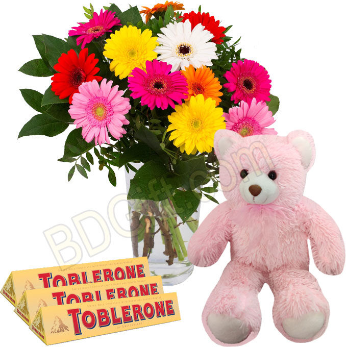 Mix gerberas with bear and chocolates